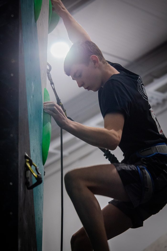 Dan climbing his way to overall 3rd on his day of lead climbing at the Youth Climbing Series finals.