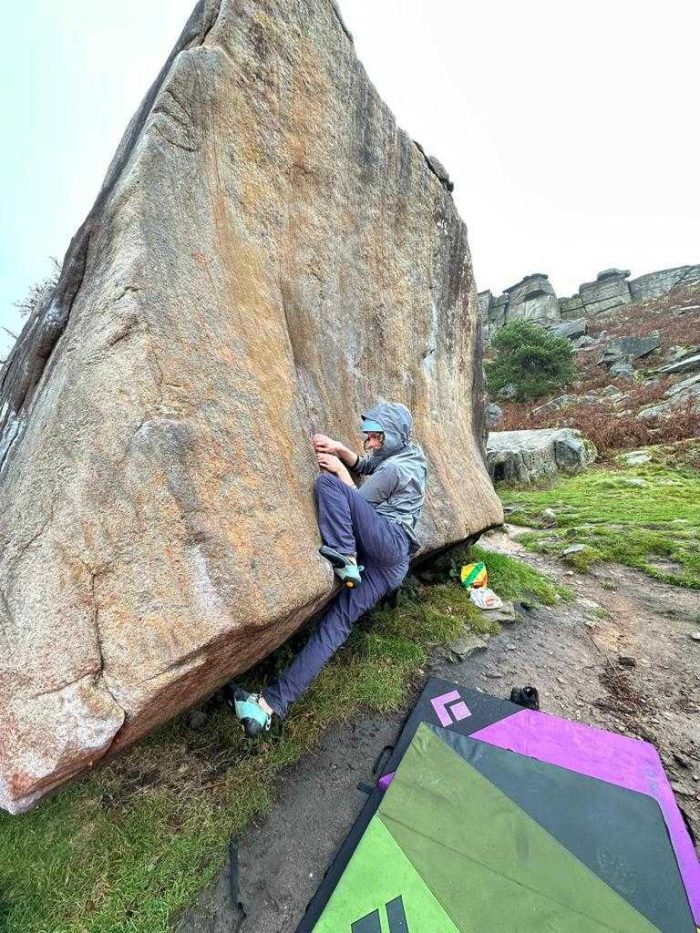 A Parthian climber pulling on to a tricky boulder!