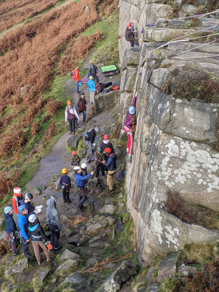 The Parthian community enjoying some Peak District grit climbing.